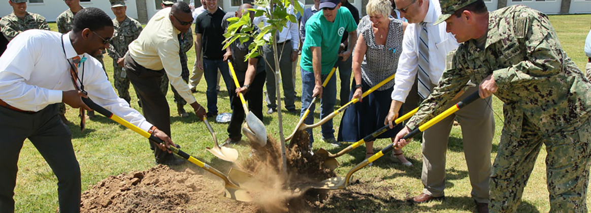 NSWC Corona Uniformed and Civilian personnel attend a tree planting ceremony.